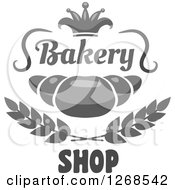 Clipart Of A Grayscale Croissant With Wheat Text And A Crown Royalty Free Vector Illustration