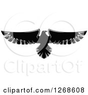 Clipart Of A Black And White Eagle In Flight Royalty Free Vector Illustration