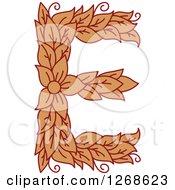 Clipart Of A Floral Capital Letter E With A Flower Royalty Free Vector Illustration
