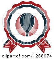 Clipart Of A Red White And Blue Hot Air Balloon Ribbon Design Royalty Free Vector Illustration
