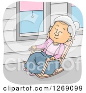 Senior Caucasian Woman Napping In A Rocking Chair On A Porch
