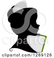 Silhouetted Black Nurse Womans Face With A Colored Chart Clipboard