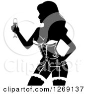 Clipart Of A Silhouetted Black And White Female Stripper Holding Champagne At A Bachelor Party Royalty Free Vector Illustration