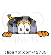 Suitcase Cartoon Character Peeking Over A Surface