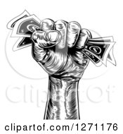Clipart Of A Black And White Engraved Revolutionary Fist Holding Money Royalty Free Vector Illustration by AtStockIllustration