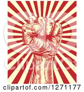 Clipart Of A Engraved Revolutionary Fist Over Beige And Red Rays Royalty Free Vector Illustration by AtStockIllustration