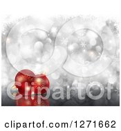 Poster, Art Print Of Christmas Background Of 3d Red Baubles Over Silver Bokeh And Snowflakes