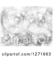 Clipart Of A Silver Bokeh And Snowflake Christmas Background Royalty Free Illustration