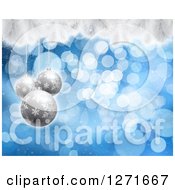 Clipart Of A Christmas Background Of 3d Silver Baubles Over Blue Bokeh And Snow Flocked Tree Branches Royalty Free Illustration