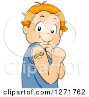 Red Haired White Boy Showing Off A Bandage Over A Vaccine Spot