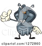 Clipart Of A Happy Rhino Beetle Holding A Thumb Up Royalty Free Vector Illustration