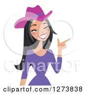 Clipart Of A Black Haired Cowgirl Winking And Pointing Royalty Free Vector Illustration by peachidesigns