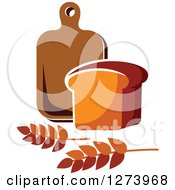 Loaf Of Bread Wheat And Wood Cutting Board