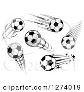 Clipart Of Flying Soccer Balls Royalty Free Vector Illustration