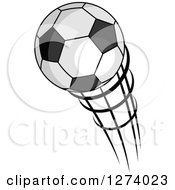 Clipart Of A Grayscale Flying Soccer Ball Royalty Free Vector Illustration