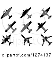 Clipart Of Black Silhouetted Airplanes Royalty Free Vector Illustration