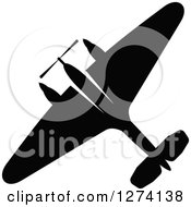 Clipart Of A Black Silhouetted Airplane Royalty Free Vector Illustration