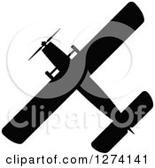 Clipart Of A Black Silhouetted Airplane 4 Royalty Free Vector Illustration