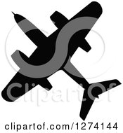 Clipart Of A Black Silhouetted Airplane 7 Royalty Free Vector Illustration