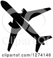 Clipart Of A Black Silhouetted Commercial Airplane 2 Royalty Free Vector Illustration