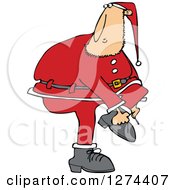 Clipart Of A Christmas Santa Clause Trying To Put On A Boot Royalty Free Vector Illustration