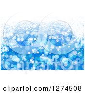 Clipart Of A Blue Christmas Background With Bokeh And Snowflakes Royalty Free Illustration