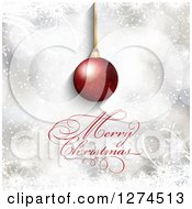 Clipart Of A Merry Christmas Greeting Under A 3d Gold Bauble With Flares And Snowflakes Royalty Free Vector Illustration