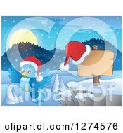 Poster, Art Print Of Christmas Blue Bird Flying By A Wood Sign With A Santa Hat And Winter Landscape At Night