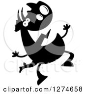 Clipart Of A Black And White Silhouetted Happy Triceratops Dinosaur Jumping Royalty Free Vector Illustration