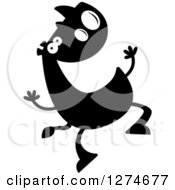 Clipart Of A Black And White Silhouetted Happy Rhinoceros Jumping Royalty Free Vector Illustration