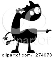 Clipart Of A Black And White Silhouetted Mad Rhinoceros Pointing Royalty Free Vector Illustration
