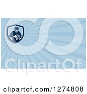 Clipart Of A Retro Photographer And Blue Rays Business Card Design Royalty Free Illustration