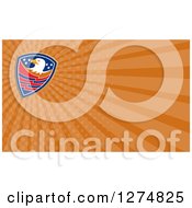 Clipart Of An American Bald Eagle And Orange Rays Business Card Design Royalty Free Illustration