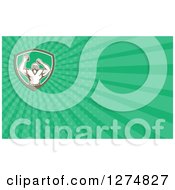 Clipart Of A Retro American Football Player Cheering And Green Rays Business Card Design Royalty Free Illustration