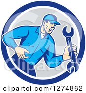 Clipart Of A Retro Mechanic Man Shouting And Holding A Spanner Wrench In A Blue White And Gray Circle Royalty Free Vector Illustration
