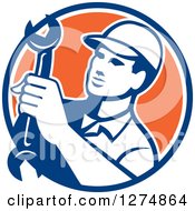 Clipart Of A Retro Mechanic Man Holding A Spanner Wrench In A Blue White And Orange Circle Royalty Free Vector Illustration