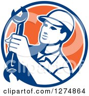 Poster, Art Print Of Retro Mechanic Man Holding A Spanner Wrench In A Blue White And Orange Circle