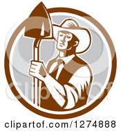 Retro Woodcut Male Farmer Holding A Shovel In A Brown White And Gray Circle