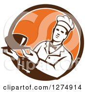 Male Chef Holding A Bowl Of Soup In A Brown White And Orange Circle