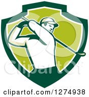 Retro Male Golfer Swinging In A Green And White Shield
