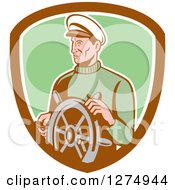 Retro Male Sea Captain At The Wheel In A Brown White And Green Shield