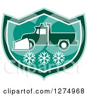 Retro Snow Plow Truck Over Snowflakes In A Tuquoise Green And White Shield