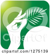 Green And White Hand Holding A Branch Or Duster Icon
