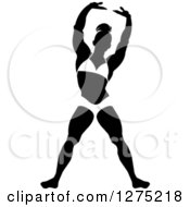 Poster, Art Print Of Silhouetted Black And White Stretching Female Bodybuilder