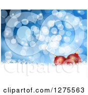 Poster, Art Print Of Christmas Background Of 3d Red Ornaments Over Snow And Blue Bokeh