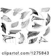 Clipart Of Black And White And Grayscale Feathered Wings Royalty Free Vector Illustration