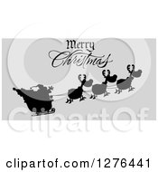 Poster, Art Print Of Merry Christmas Greeting Over A Black Silhouetted Santa And Flying Reindeer On Gray