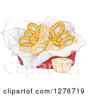 Basket Of Onion Rings And Dipping Sauce