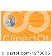 Clipart Of A Retro Photographer And Orange Rays Business Card Design Royalty Free Illustration
