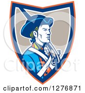 Retro American Patriot Soldier With A Musket In An Orange Blue White And Taupe Shield